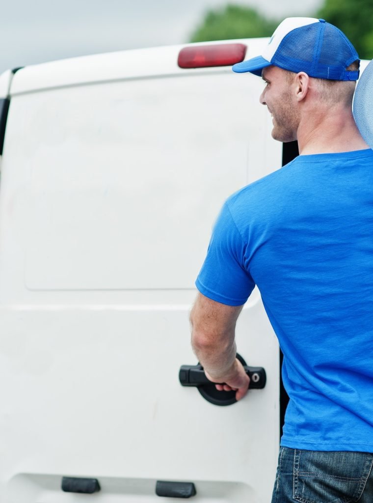 delivery-man-in-front-cargo-van-delivering-bottles-of-water-1-2.jpg